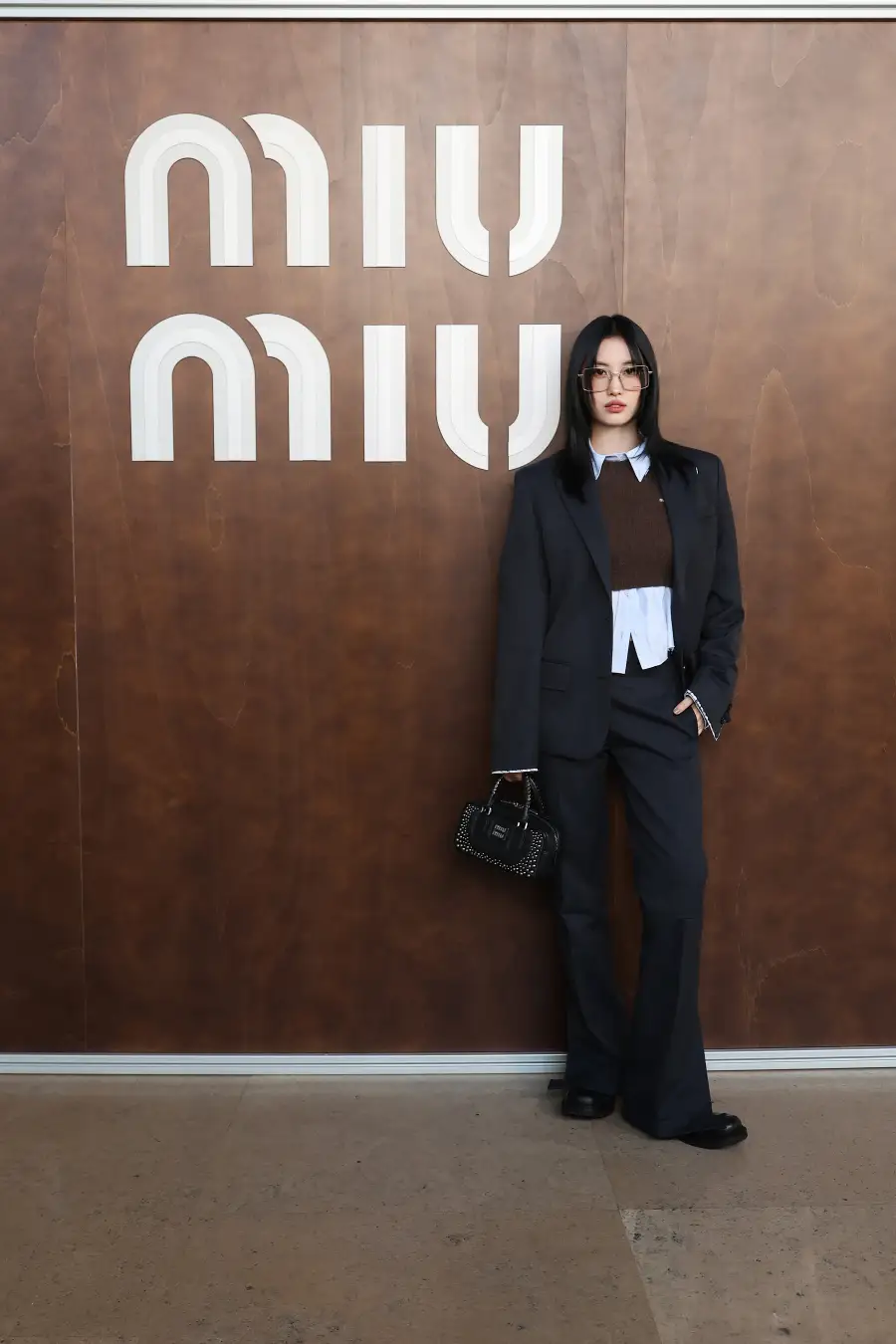 Miu Miuのショーに来場したMOMOのジャケットスタイル